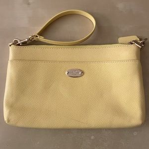 Coach Wristlet in light yellow